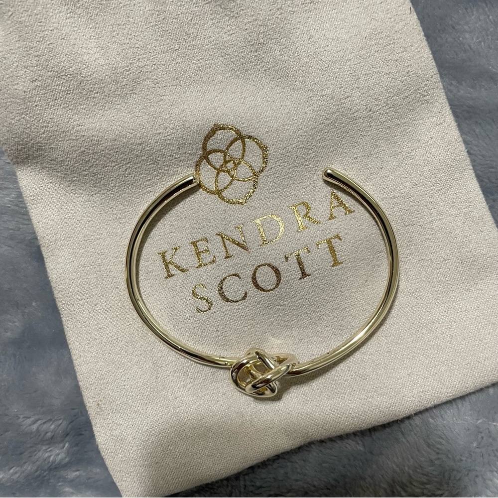 Kendra Scott Presleigh Love Knot bracelet. Gold finish, cuff.